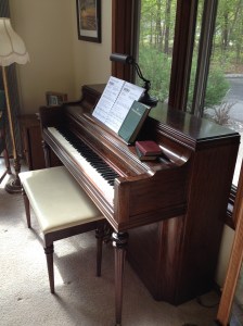 My mom's piano in my home.
